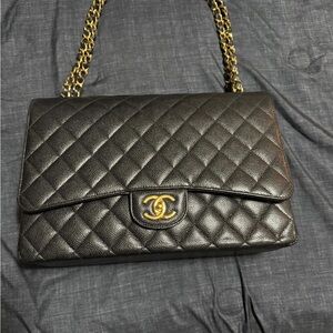 CHANEL Black Quilted Shoulder Bag with Gold Accents
